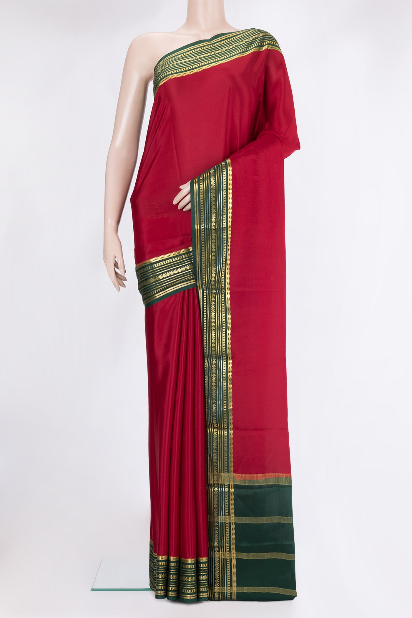 Maroon Mysore Crepe Saree with Plain Body and Fancy Border.  displayed on a mannequin