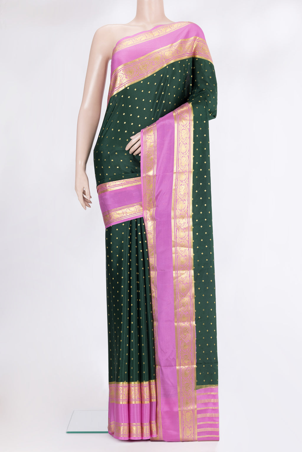 Bottle Green Mysore Chiffon Saree with Zari Butta on the body and Zari Border.  displayed on a mannequin