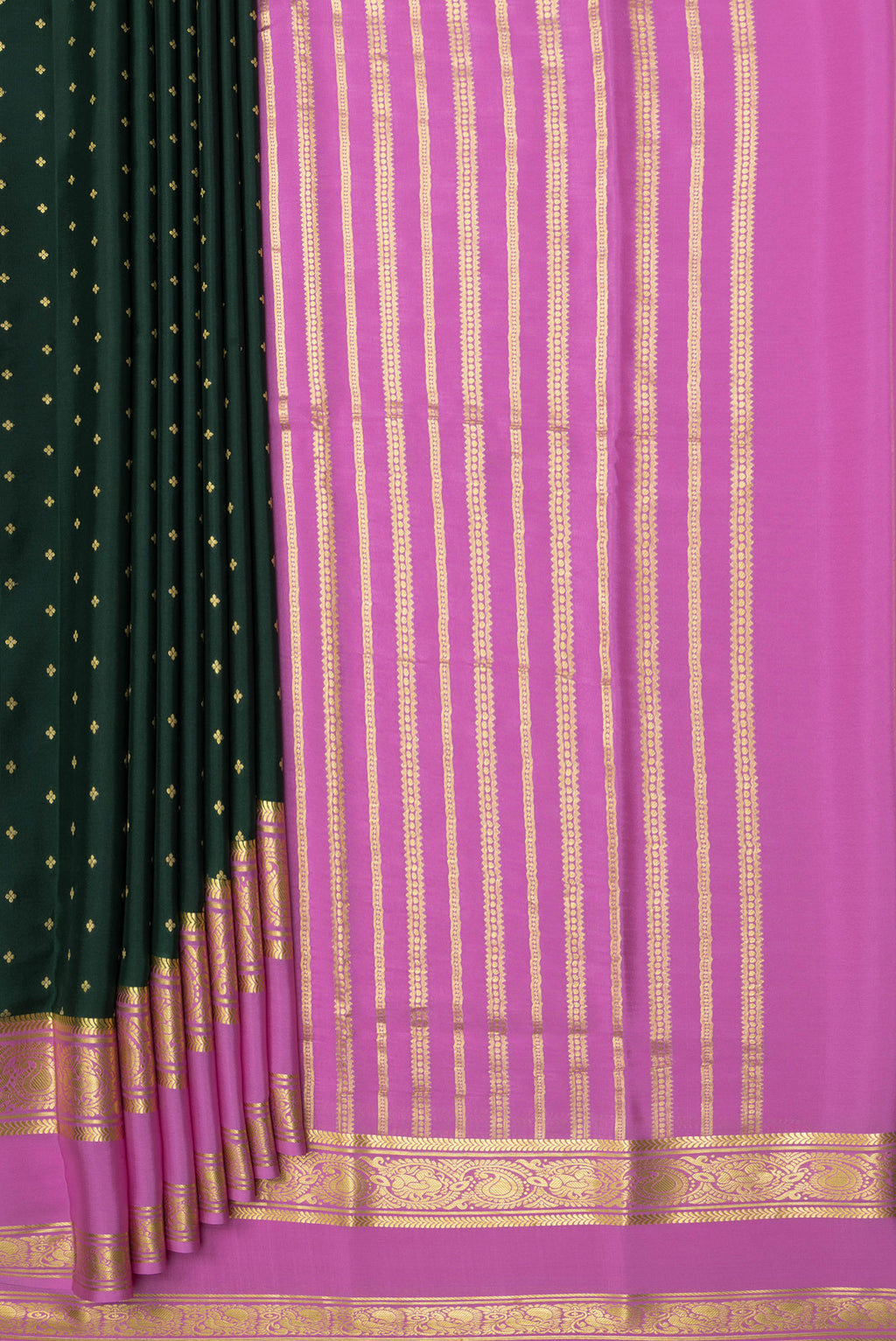 Pleats and pallu of Bottle Green Mysore Chiffon Saree with Zari Butta on the body and Zari Border. 