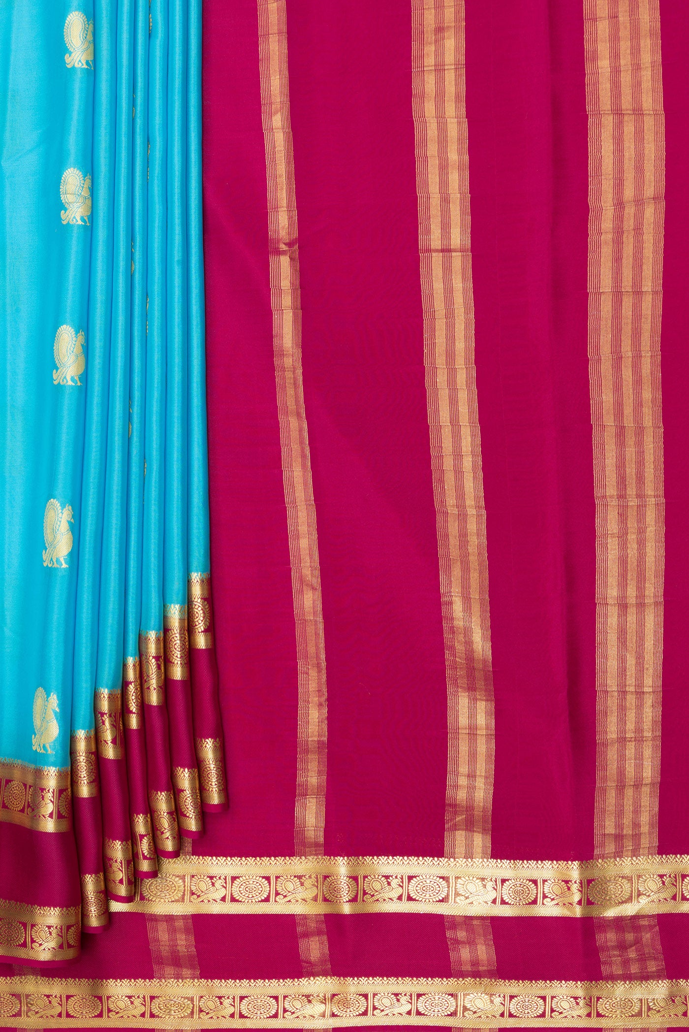 Pleats and pallu of Sky Blue Mysore Chiffon Saree with Zari Butta on the body and Fancy Border. 