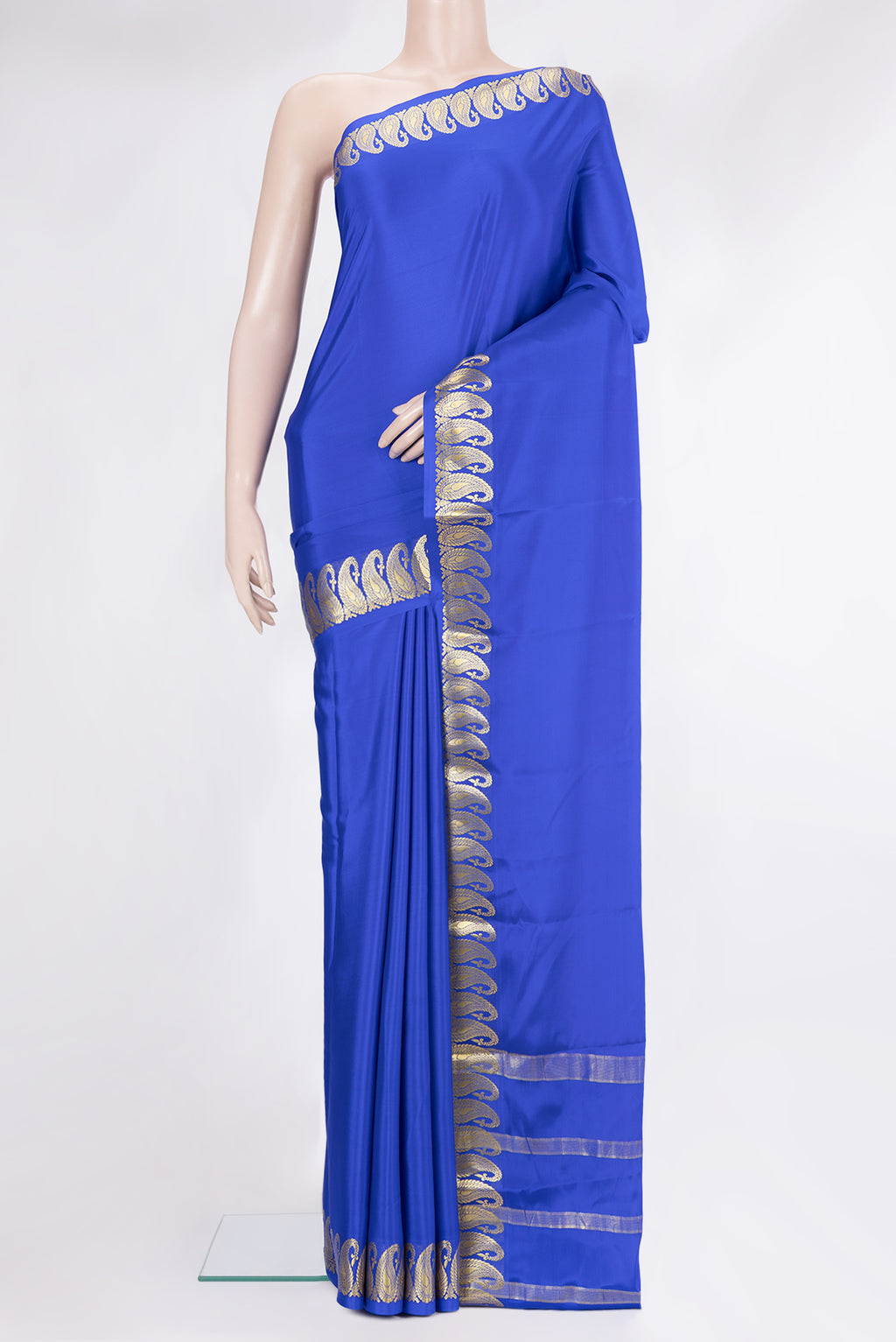 Royal Blue Mysore Crepe Saree with Plain Body and Fancy Border.  displayed on a mannequin