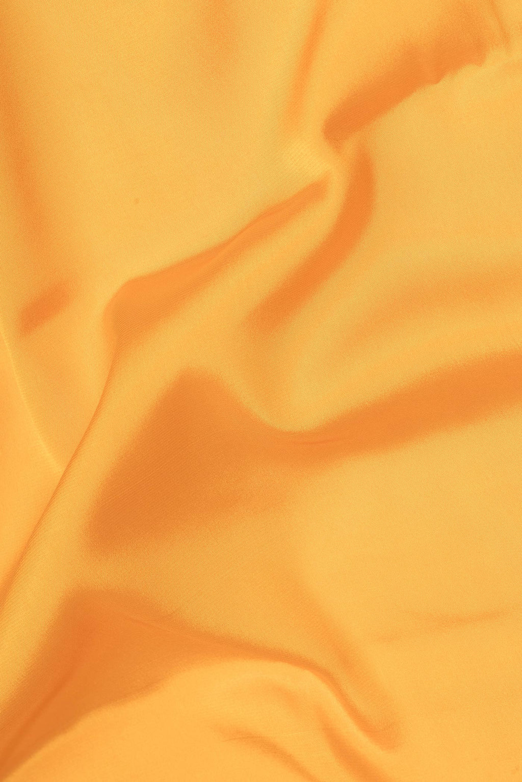 Close up of Pure Silk Yellow Mysore Silk Saree with Plain Body and Zari Border.  displaying folds
