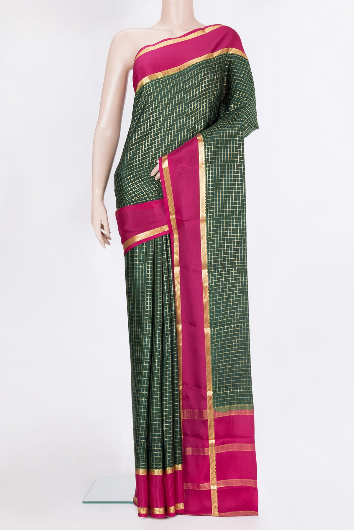 Bottle Green Mysore Silk Saree with Checked design on the body and Zari Border.  displayed on a mannequin