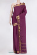 Pure Silk Purple Mysore Silk Saree with Plain Body and Zari Border.  displayed on a mannequin