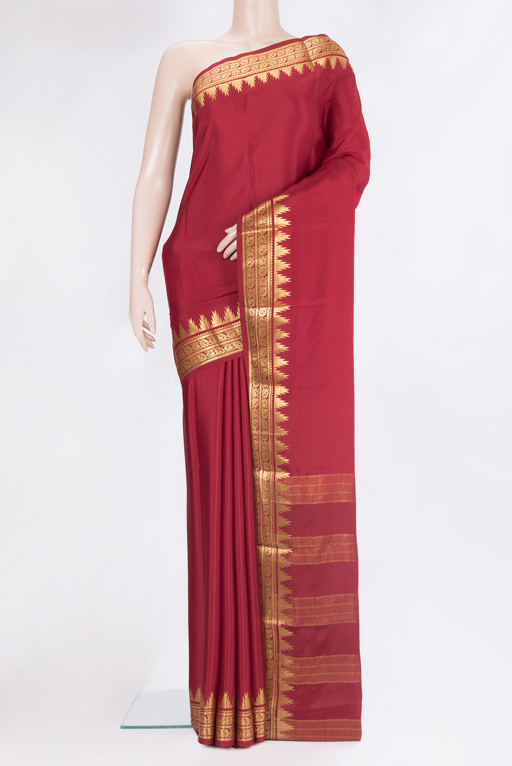 Pure Silk Maroon Mysore Silk Saree with Plain Body and Zari Border.  displayed on a mannequin