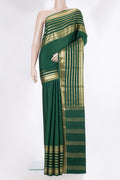 Bottle Green Mysore Crepe Saree with Plain Body and Fancy Border.  displayed on a mannequin
