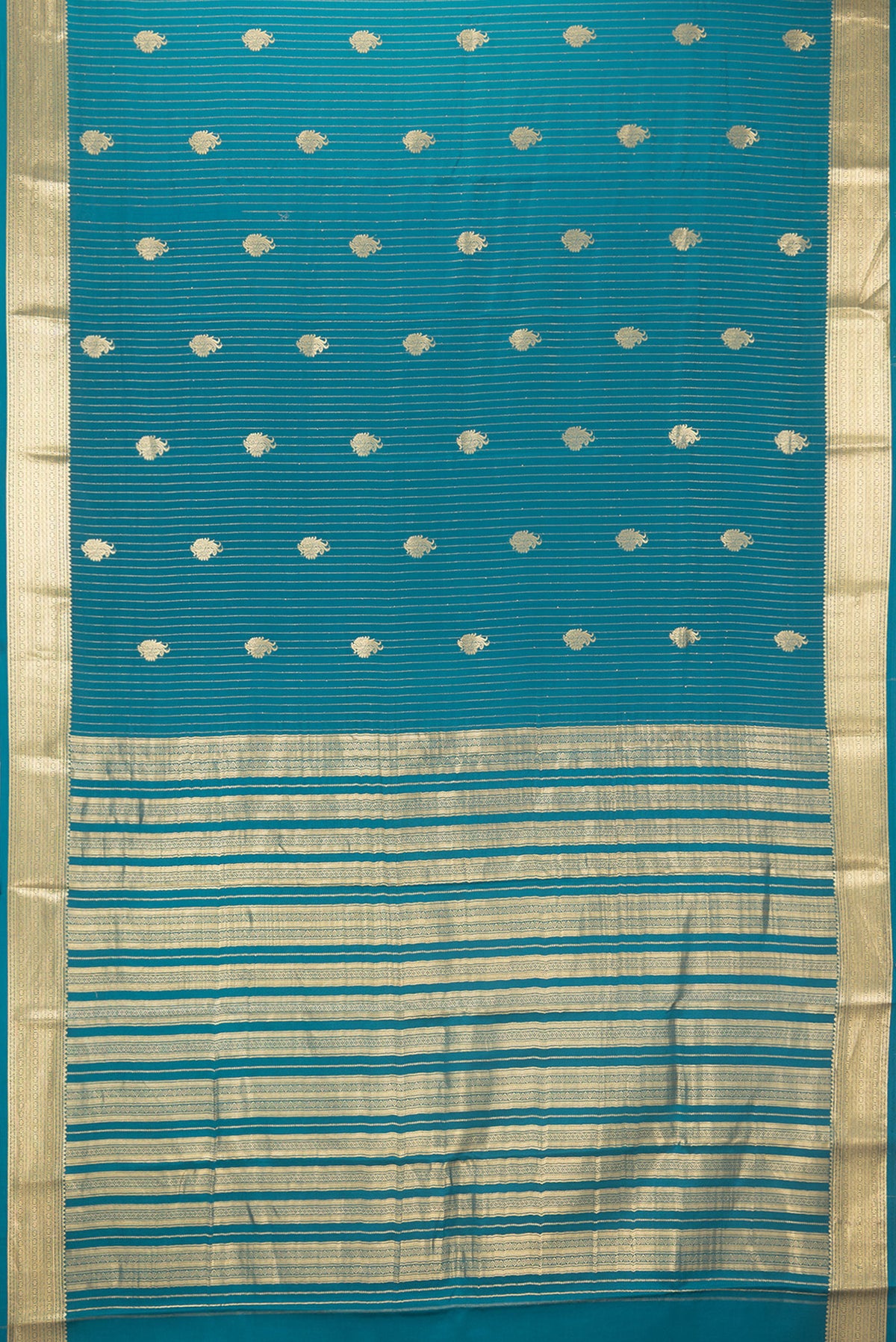 Flat view of Pure Silk Blue Mysore Silk Saree with Zari Butta on the body and Zari Border. 