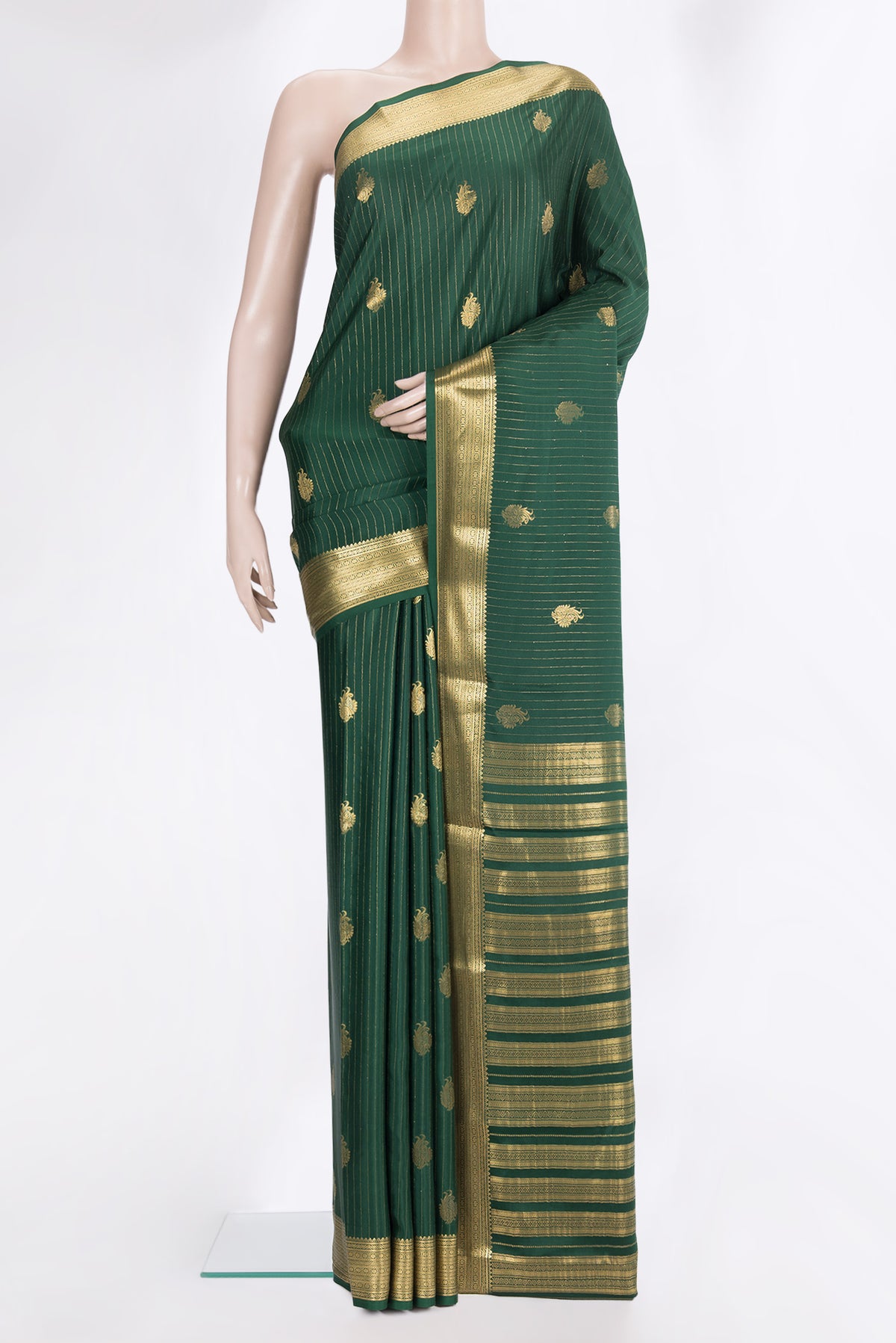 Bottle Green Mysore Crepe Saree with Stripes on the body and Zari Border.  displayed on a mannequin