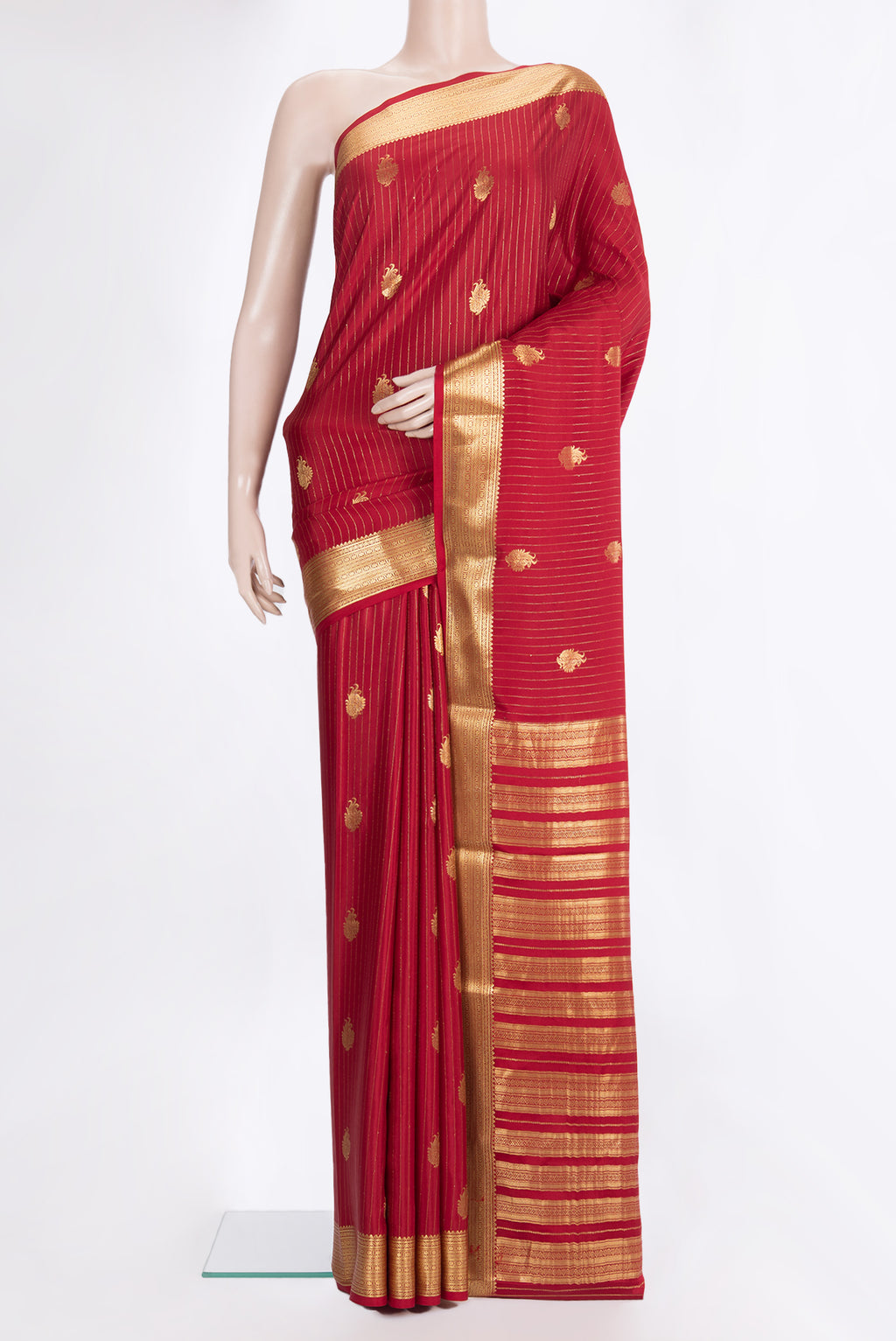 Red Mysore Crepe Saree with Stripes on the body and Zari Border.  displayed on a mannequin