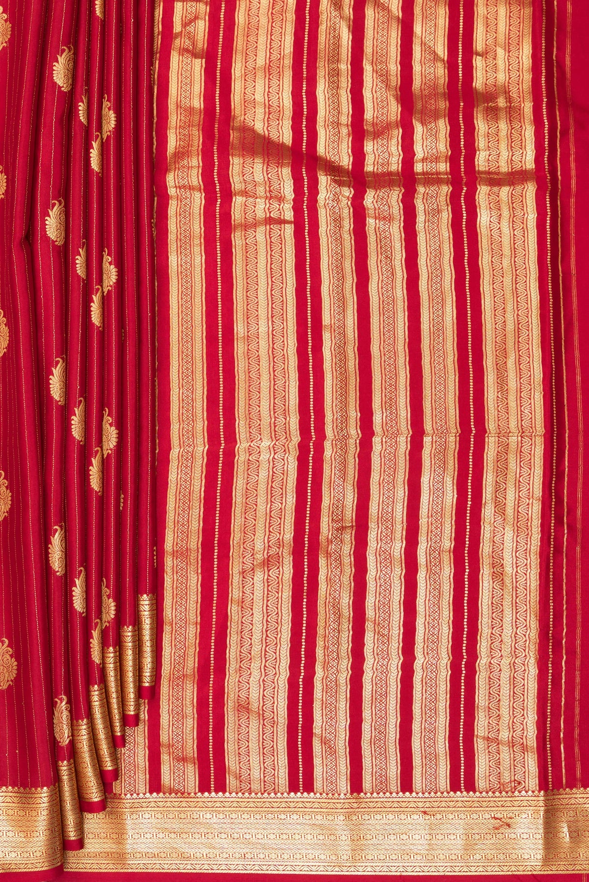 Pleats and pallu of Red Mysore Crepe Saree with Stripes on the body and Zari Border. 