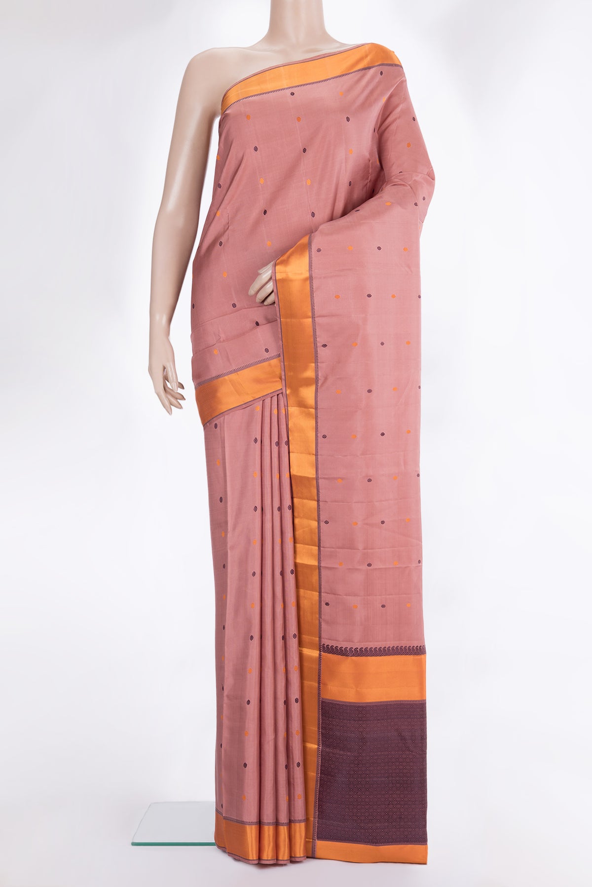 Pure Silk Peach Kanjivaram Saree with Thread Butta on the body and Thread Border.  displayed on a mannequin