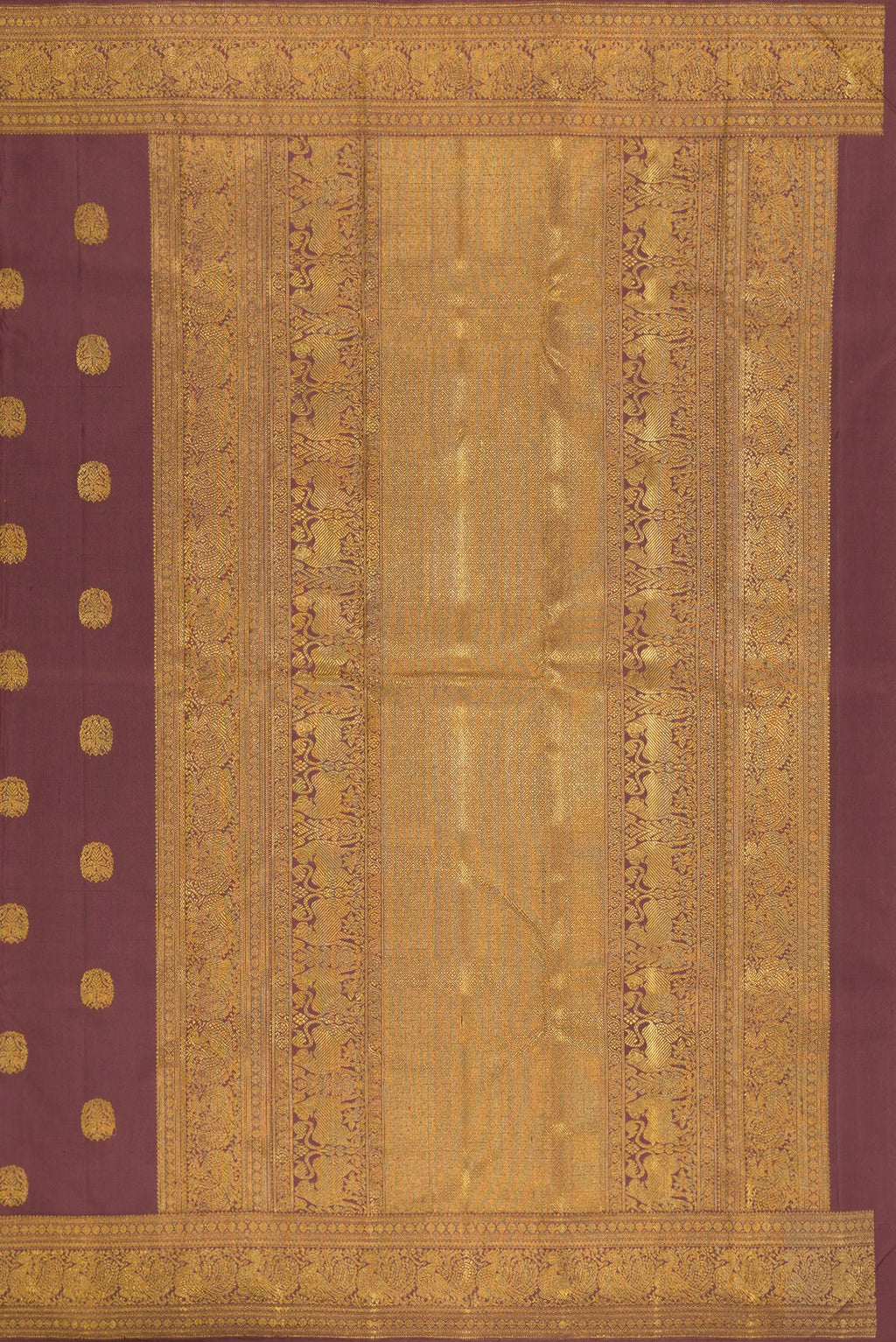 Close up image of the pallu of Pure Silk Pure Zari Brown Kanjivaram Saree with Zari Butta on the body and Zari Border. 