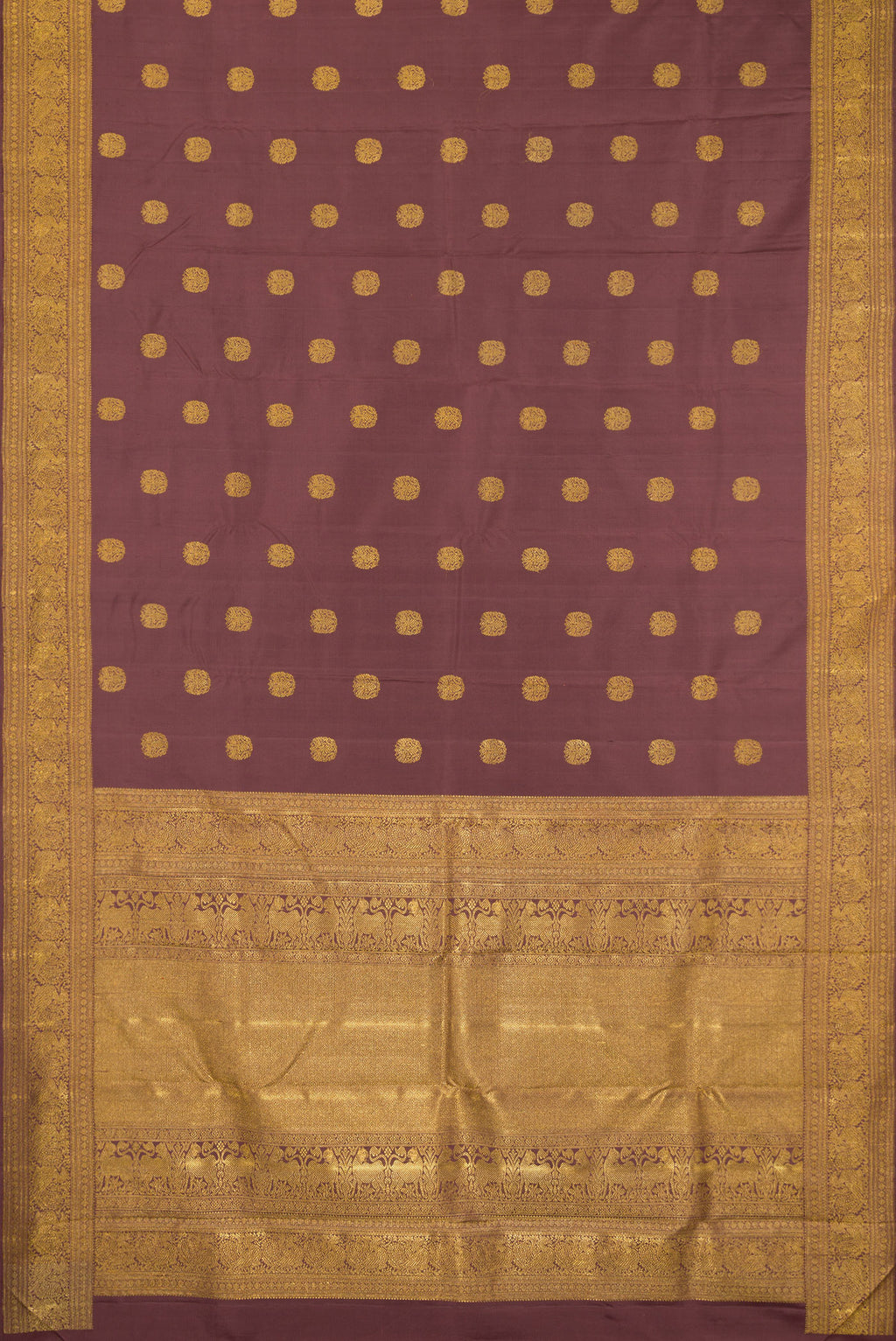 Flat view of Pure Silk Pure Zari Brown Kanjivaram Saree with Zari Butta on the body and Zari Border. 