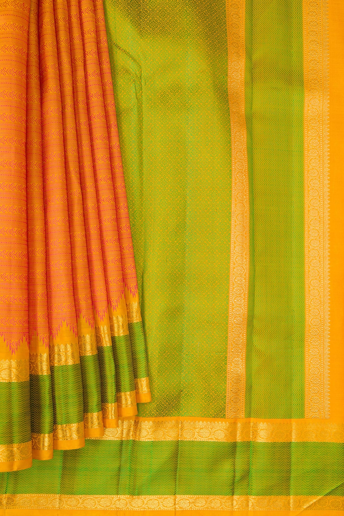 Pleats and pallu of Pure Silk Pure Zari Orange Kanjivaram Saree with Jacquard design on the body and Zari And Thread Border. 