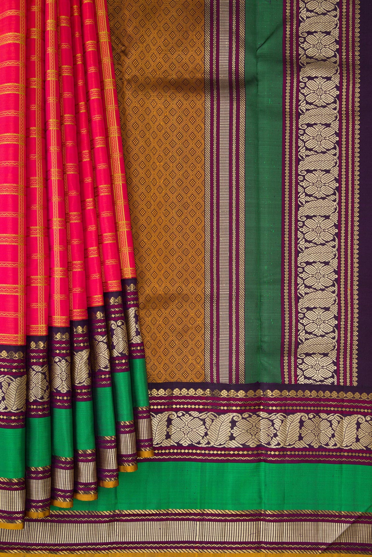 Pleats and pallu of Pure Silk Pure Zari Coral Dual Tone Kanchipuram Saree with Checked design on the body and Zari And Thread Border. 