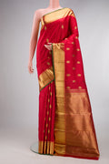 Pure Silk Pure Zari Red Kanjivaram Saree with Stripes on the body and Zari Border.  displayed on a mannequin