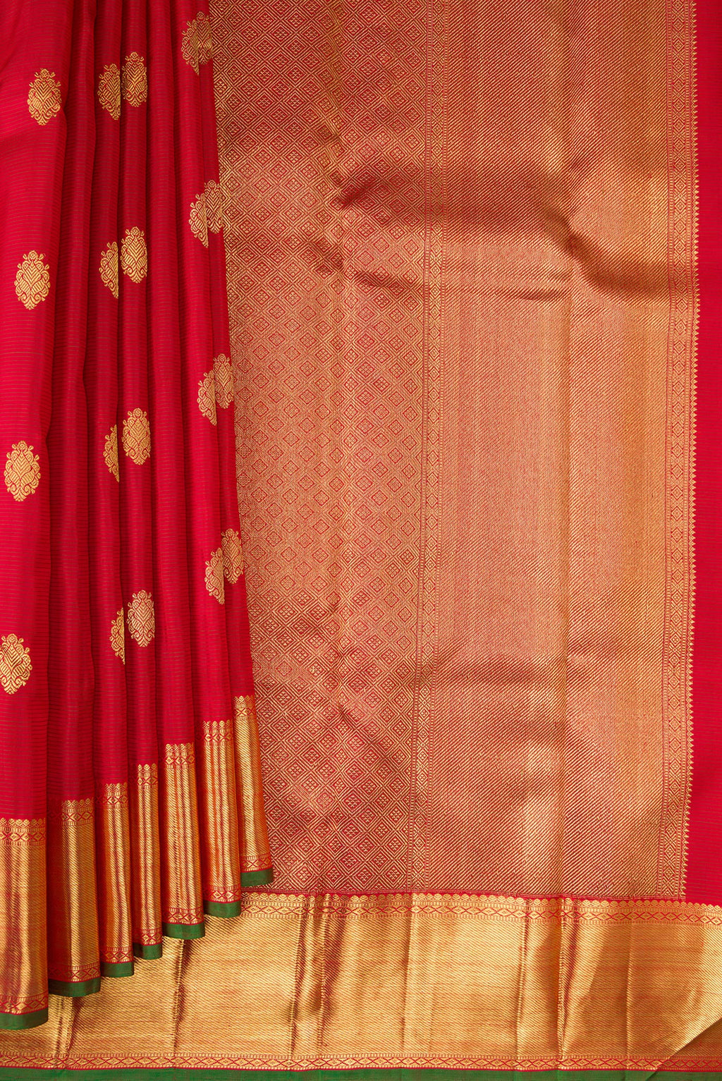 Pleats and pallu of Pure Silk Pure Zari Red Kanjivaram Saree with Stripes on the body and Zari Border. 
