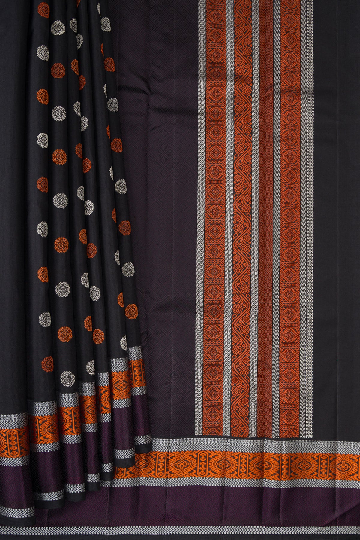 Pleats and pallu of Pure Silk Black Kanjivaram Saree with Thread Butta on the body and Thread Border. 