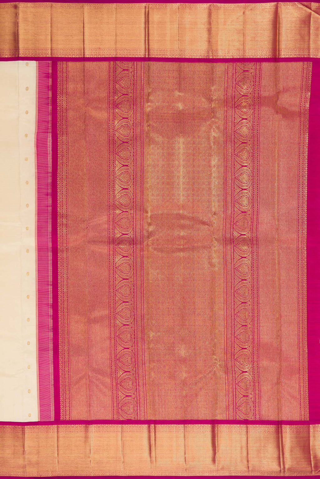 Close up image of the pallu of Pure Silk Pure Zari Cream Kanjivaram Saree with Zari Butta on the body and Zari Border. 