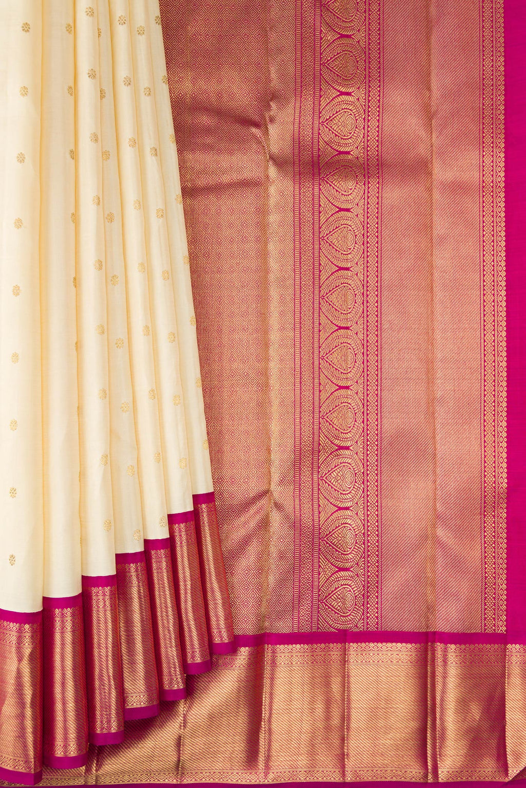 Pleats and pallu of Pure Silk Pure Zari Cream Kanjivaram Saree with Zari Butta on the body and Zari Border. 