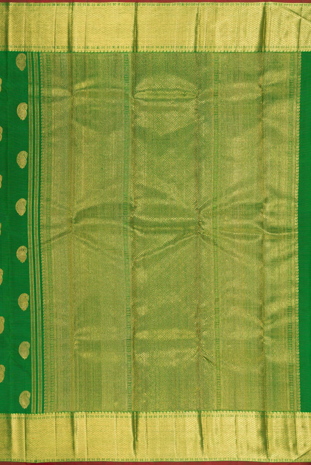 Close up image of the pallu of Pure Silk Pure Zari Green Kanjivaram Saree with Zari Butta on the body and Zari Border. 