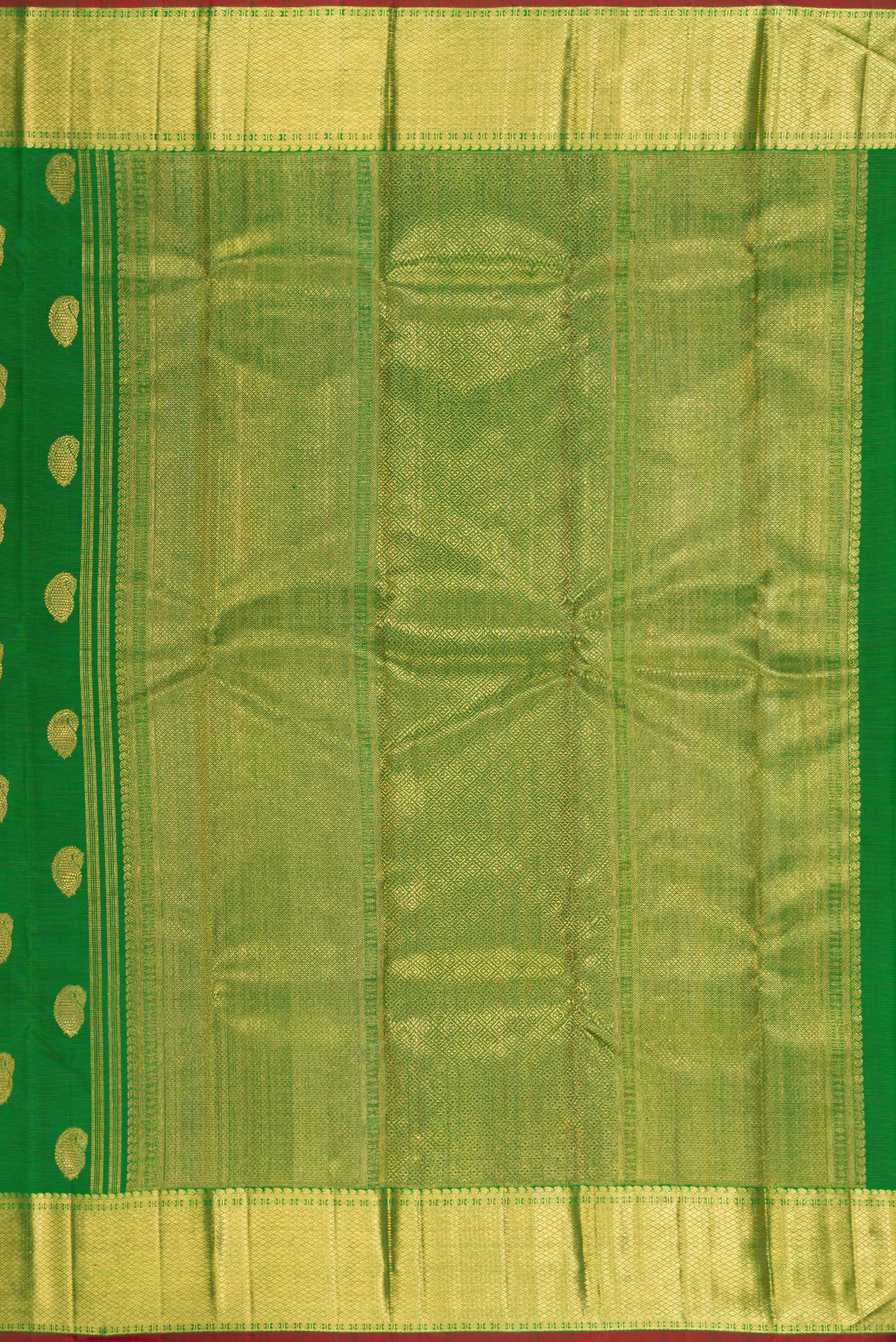Close up image of the pallu of Pure Silk Pure Zari Green Kanjivaram Saree with Zari Butta on the body and Zari Border. 