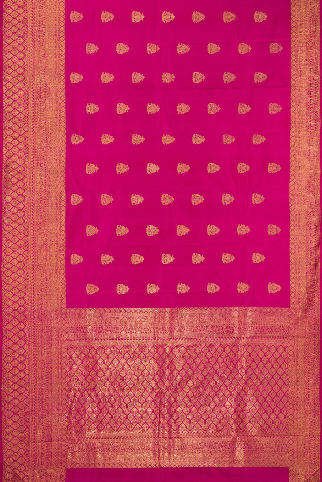 Flat view of Pure Silk Pure Zari Light Magenta Kanjivaram Saree with Zari Butta on the body and Zari Border. 