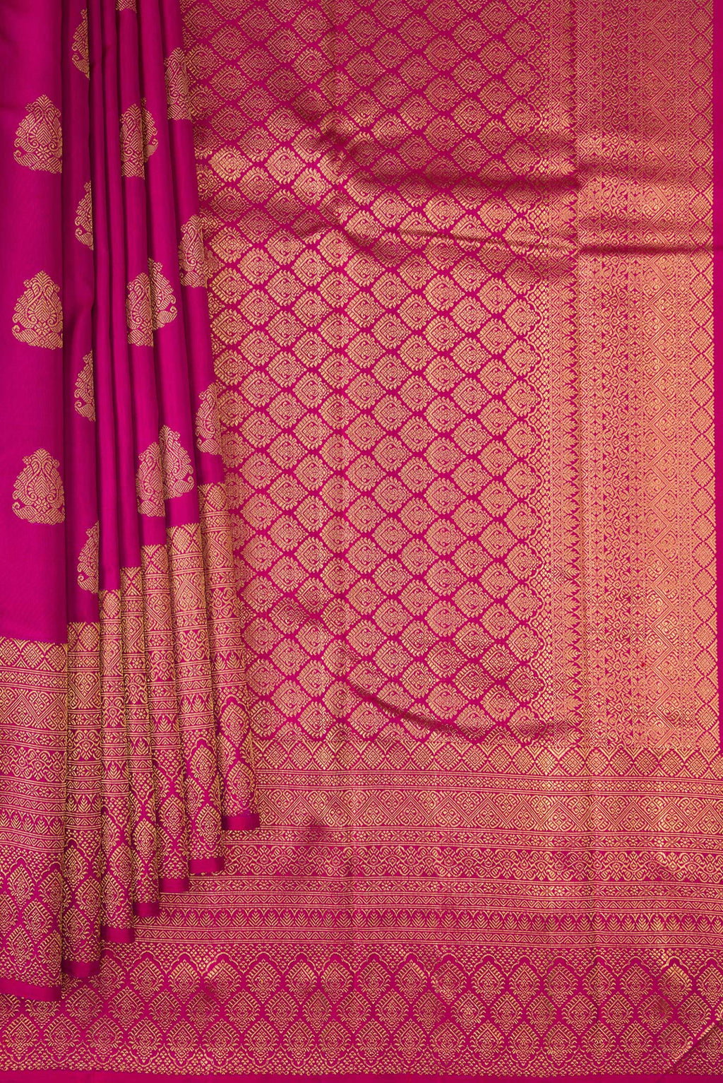 Pleats and pallu of Pure Silk Pure Zari Light Magenta Kanjivaram Saree with Zari Butta on the body and Zari Border. 