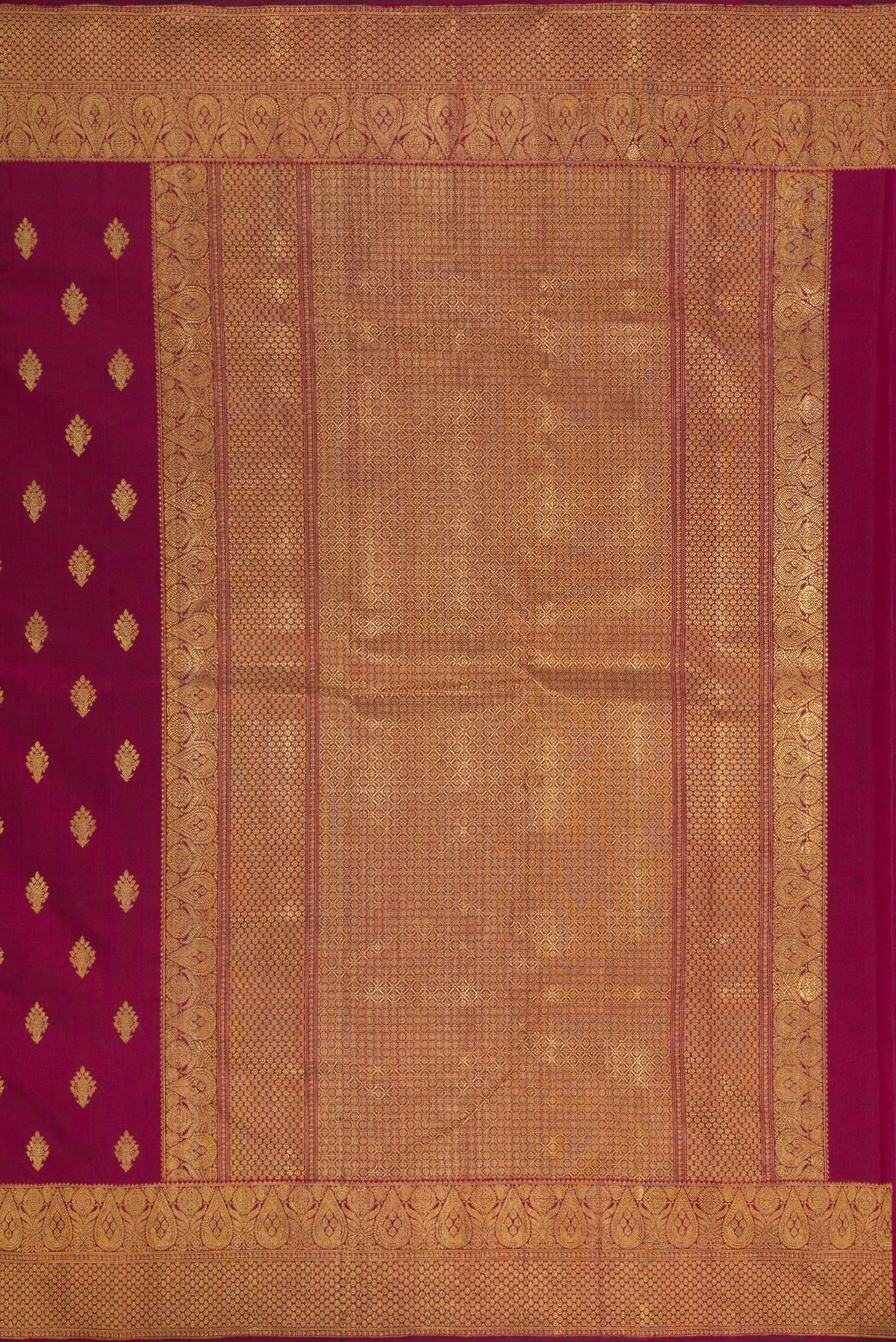 Close up image of the pallu of Pure Silk Pure Zari Maroon Kanjivaram Saree with Zari Butta on the body and Fancy Border. 