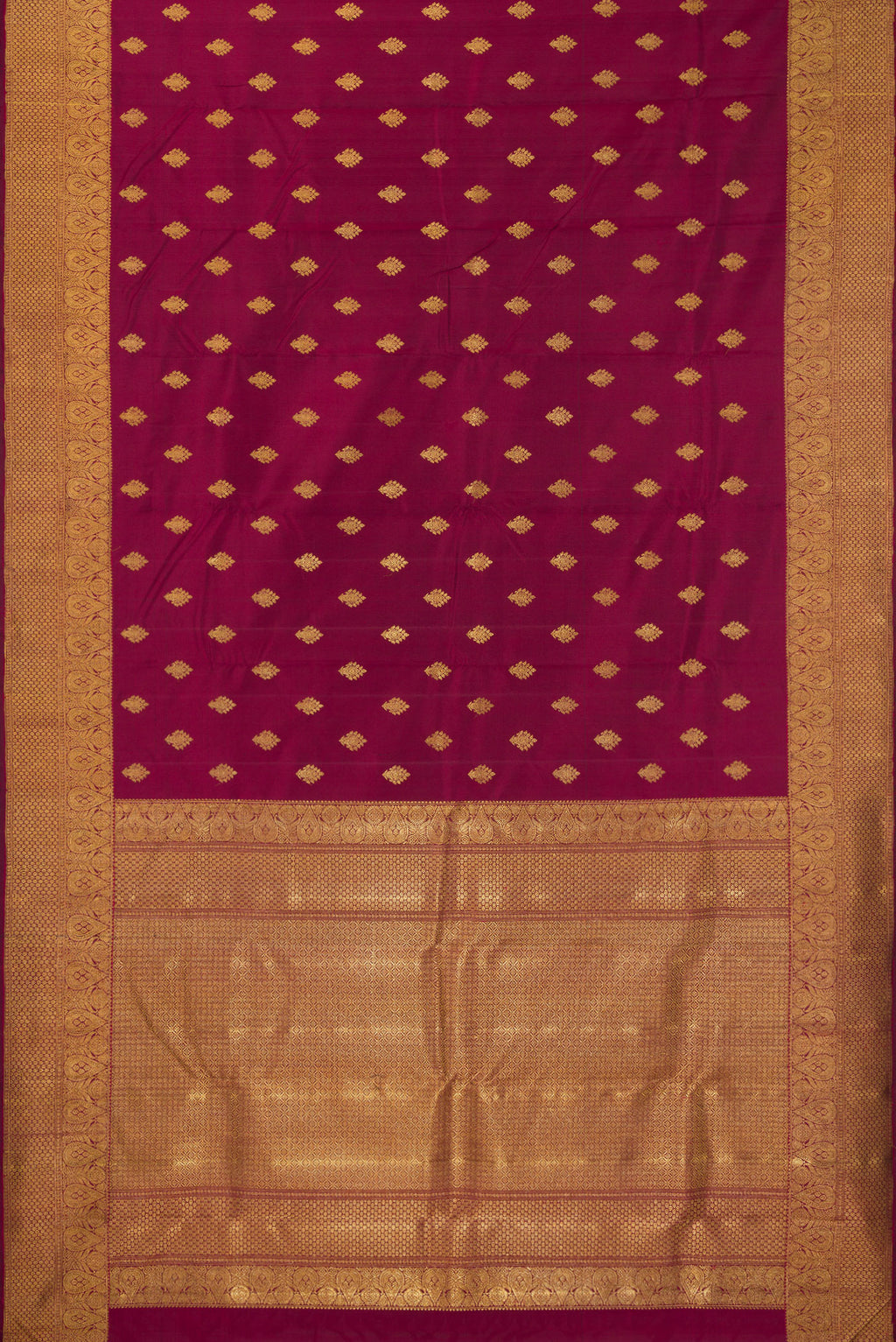 Flat view of Pure Silk Pure Zari Maroon Kanjivaram Saree with Zari Butta on the body and Fancy Border. 