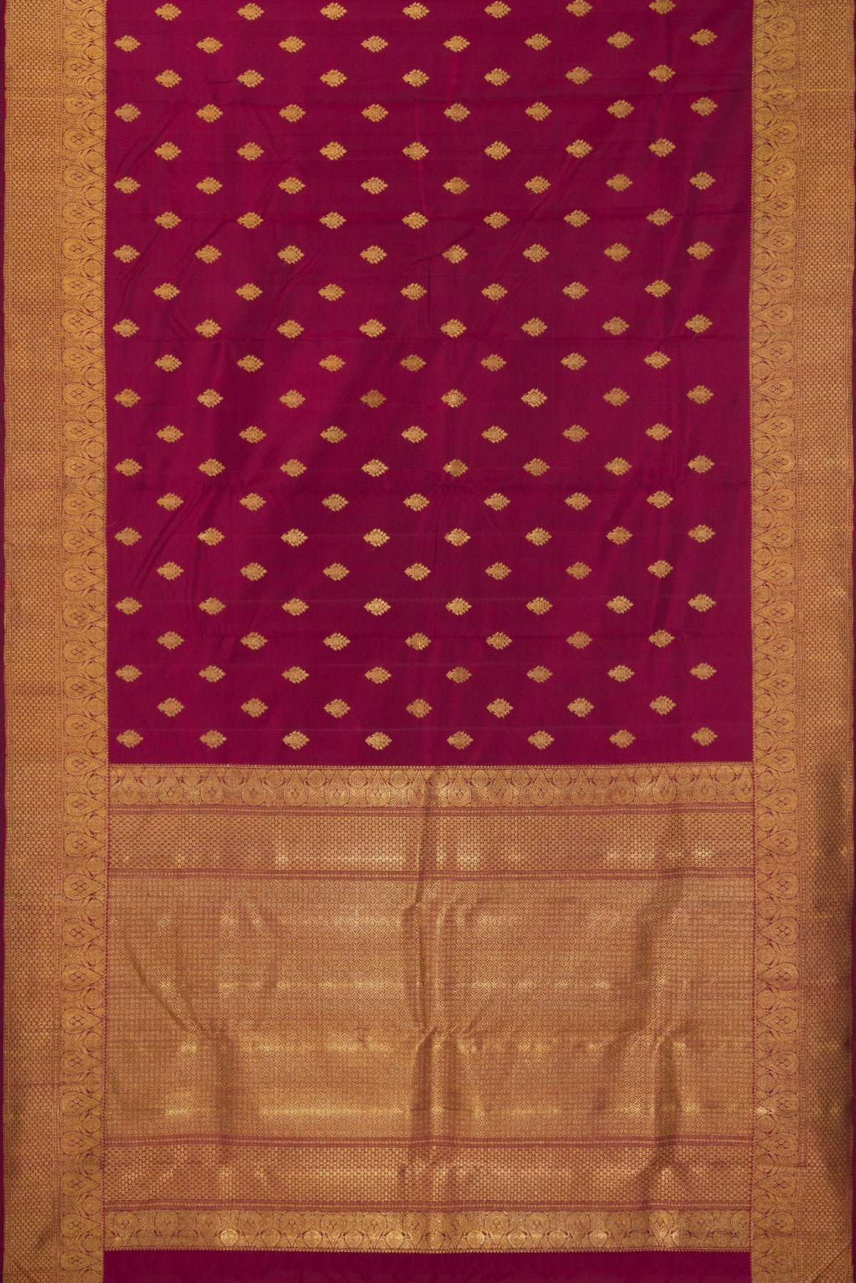 Flat view of Pure Silk Pure Zari Maroon Kanjivaram Saree with Zari Butta on the body and Fancy Border. 