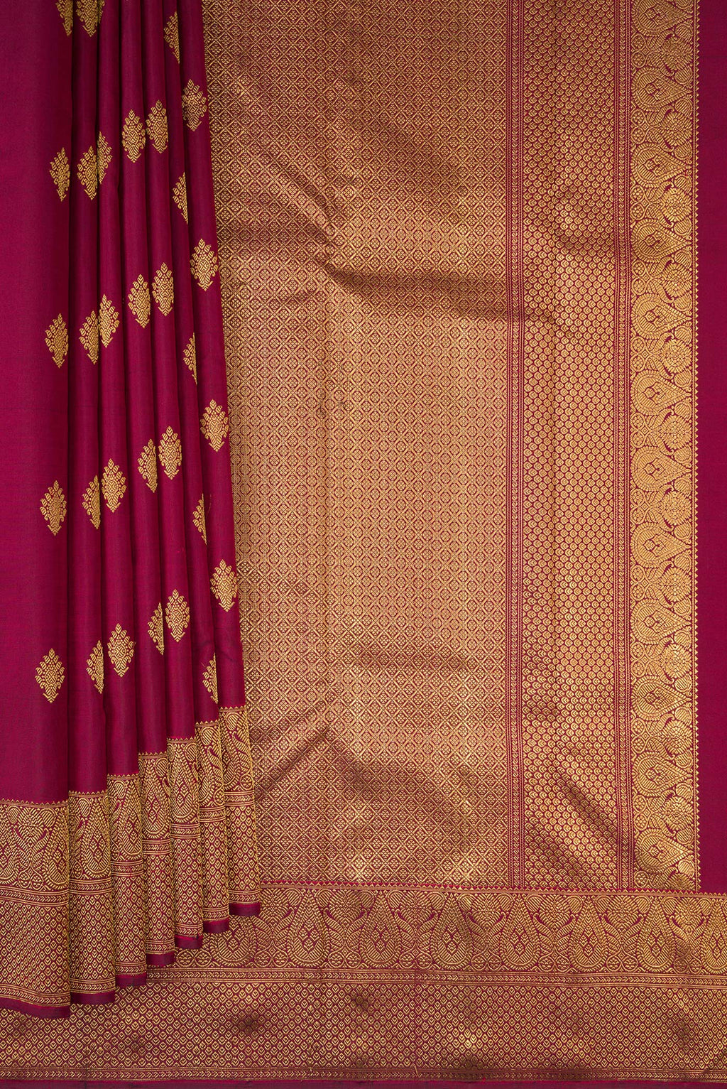 Pleats and pallu of Pure Silk Pure Zari Maroon Kanjivaram Saree with Zari Butta on the body and Fancy Border. 