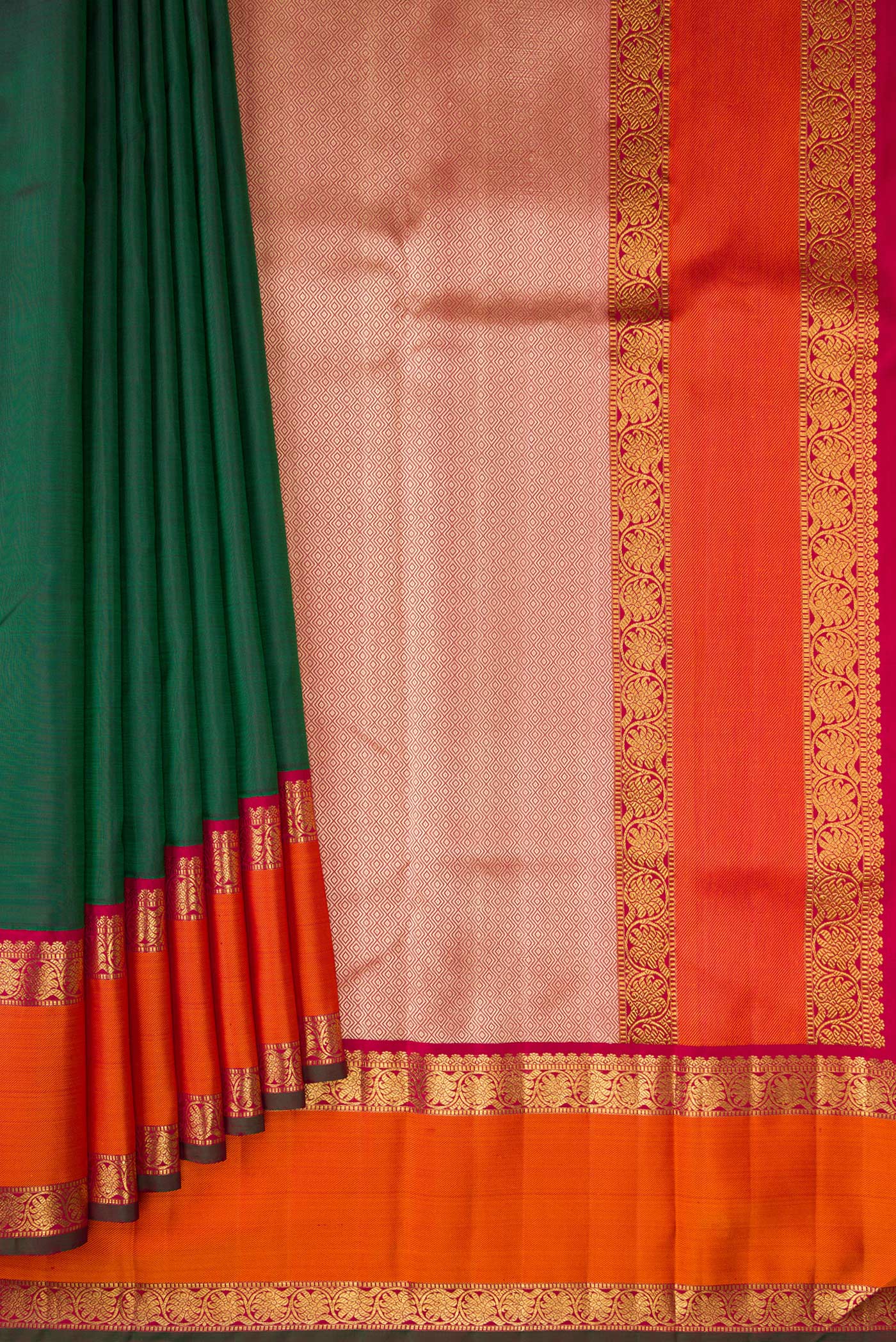 Pleats and pallu of Pure Silk Pure Zari Green Kanjivaram Saree with Plain Body and Zari Border. 