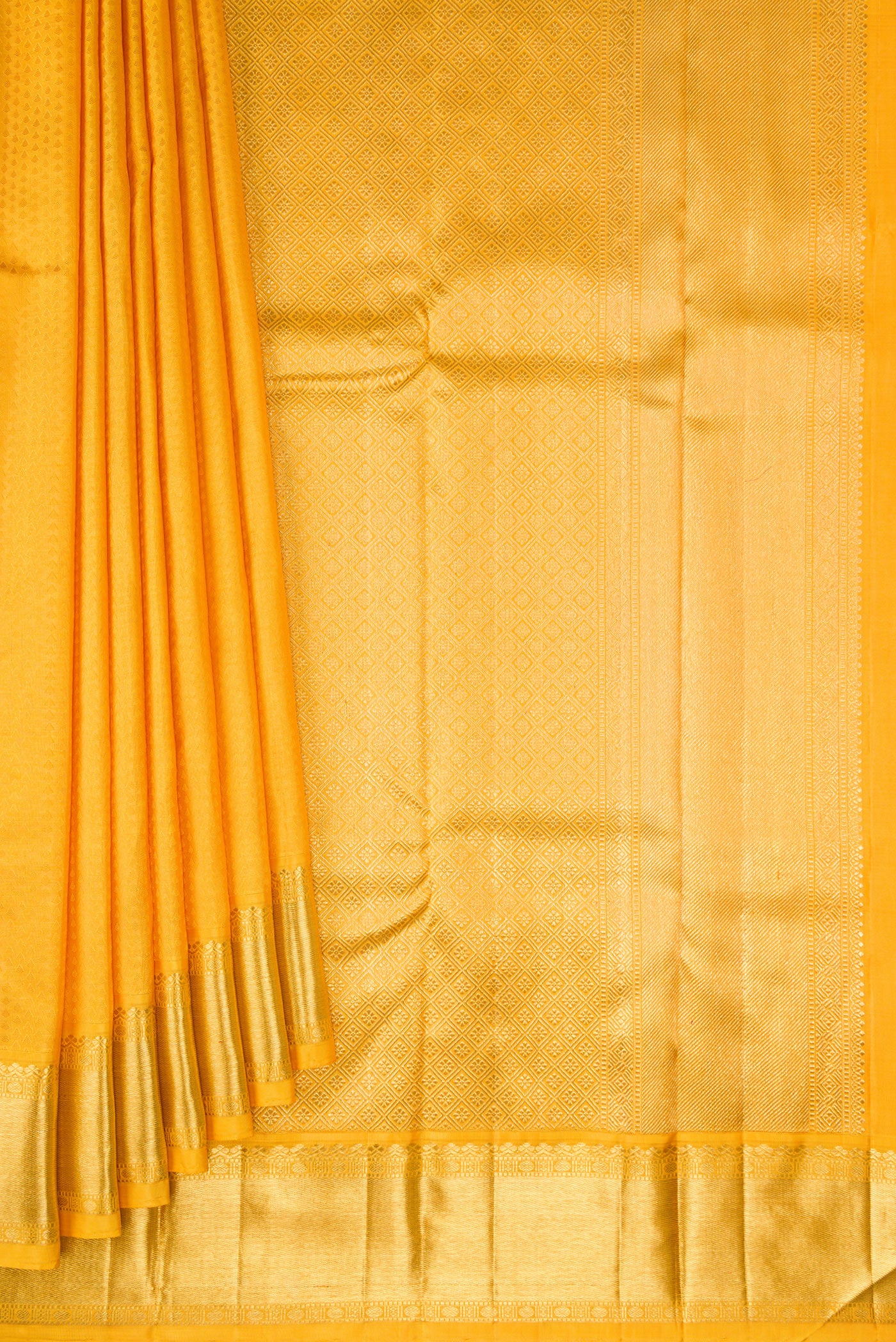 Pleats and pallu of Pure Silk Pure Zari Yellow Kanjivaram Saree with Jacquard design on the body and Zari Border. 
