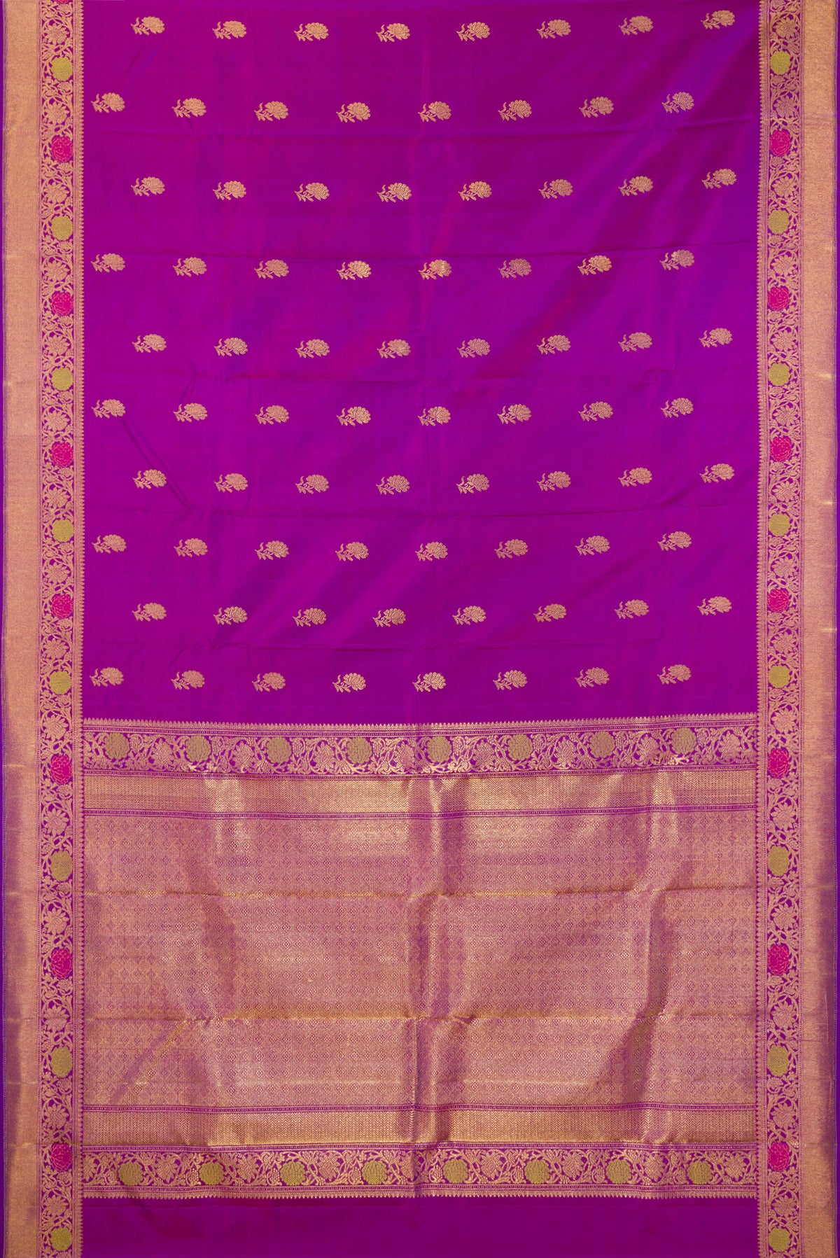 Flat view of Pure Silk Pure Zari Purple Kanjivaram Saree with Zari Butta on the body and Fancy Border. 
