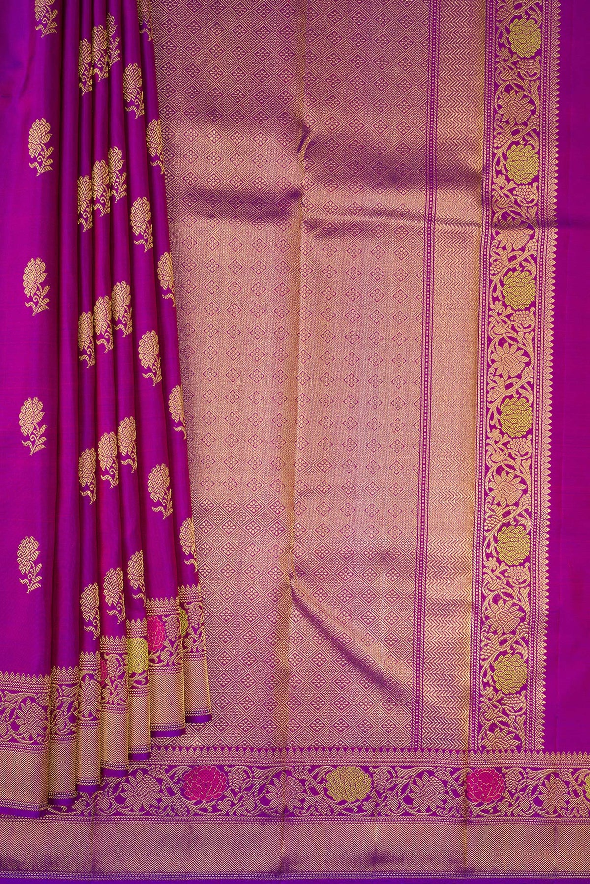 Pleats and pallu of Pure Silk Pure Zari Purple Kanjivaram Saree with Zari Butta on the body and Fancy Border. 