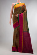 Pure Silk Green Kanjivaram Saree with Jacquard design on the body and Ganga Jamuna Border.  displayed on a mannequin