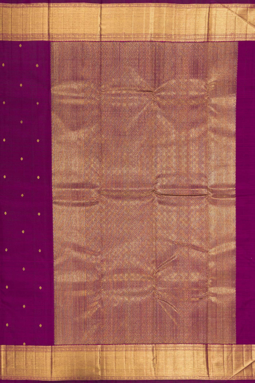 Close up image of the pallu of Pure Silk Pure Zari Magenta Kanjivaram Saree with Zari Butta on the body and Zari Border. 