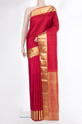 Pure Silk Red Kanjivaram Saree with Jacquard design on the body and Zari Border.  displayed on a mannequin