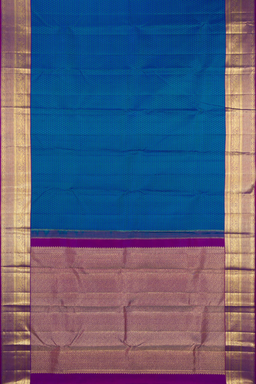 Flat view of Peacock Blue Dual Tone Kanjivaram Silk Saree with Jacquard design on the body and Zari Border. 