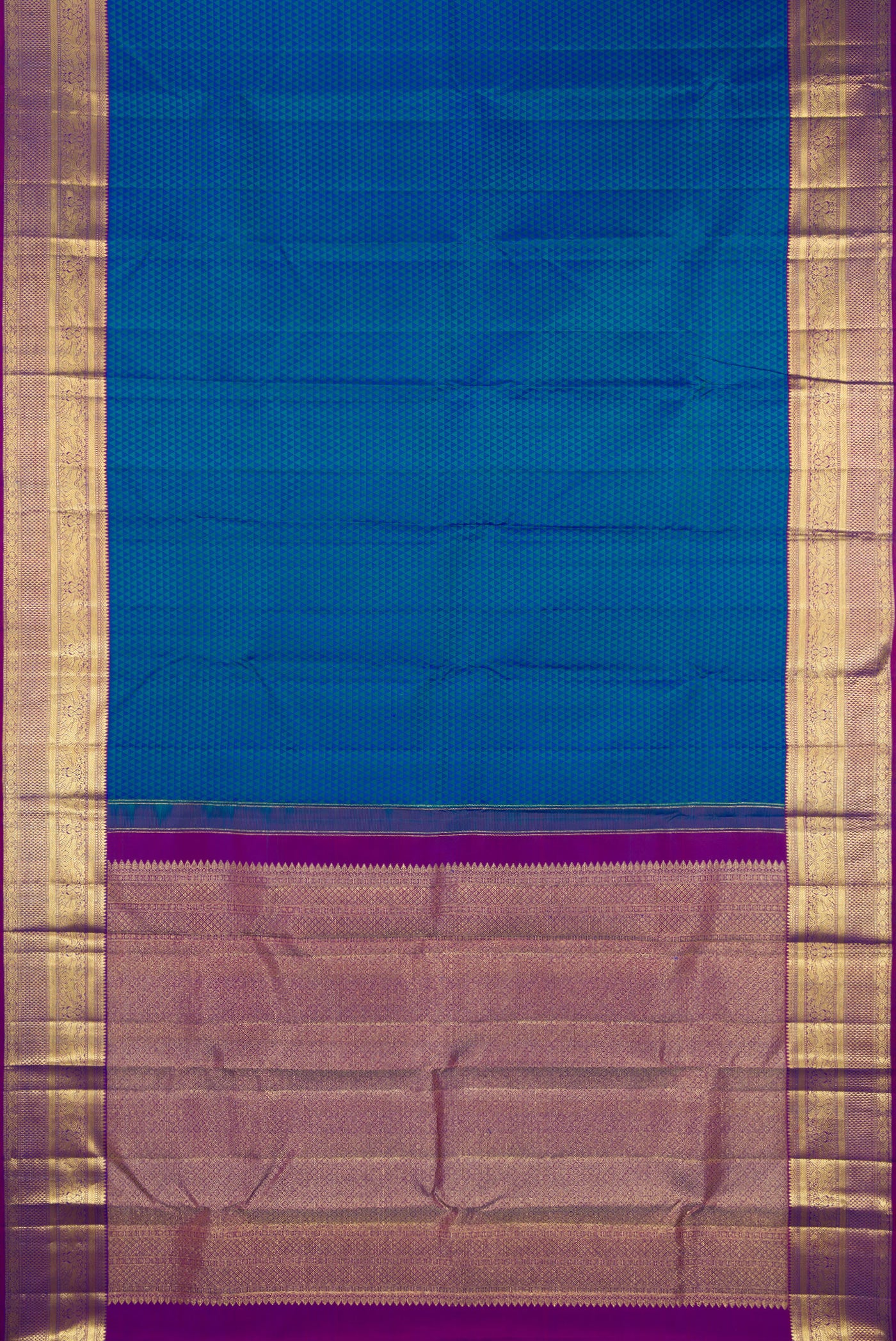 Flat view of Peacock Blue Dual Tone Kanjivaram Silk Saree with Jacquard design on the body and Zari Border. 