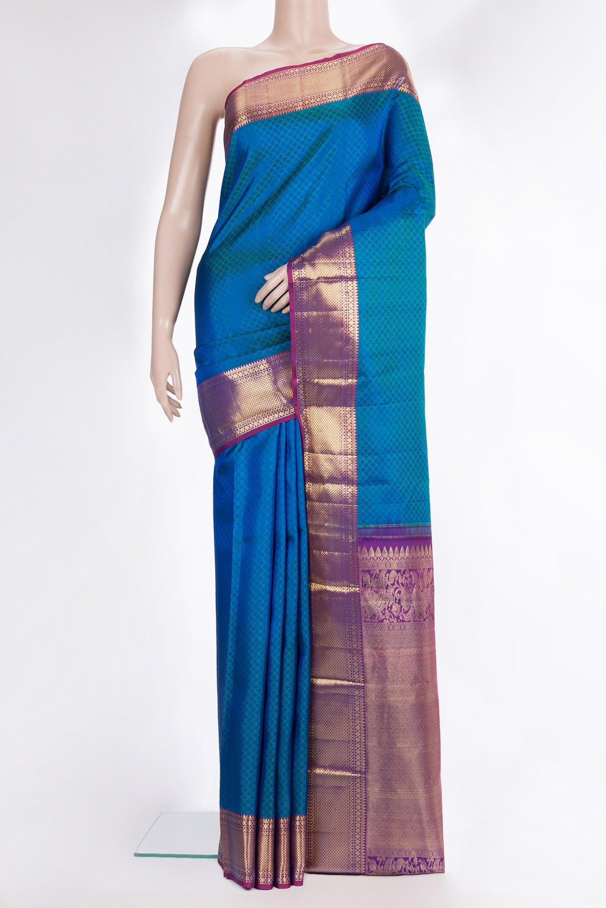 Pure Silk Peacock Blue Dual Tone Kanjivaram Saree with Jacquard design on the body and Zari Border.  displayed on a mannequin