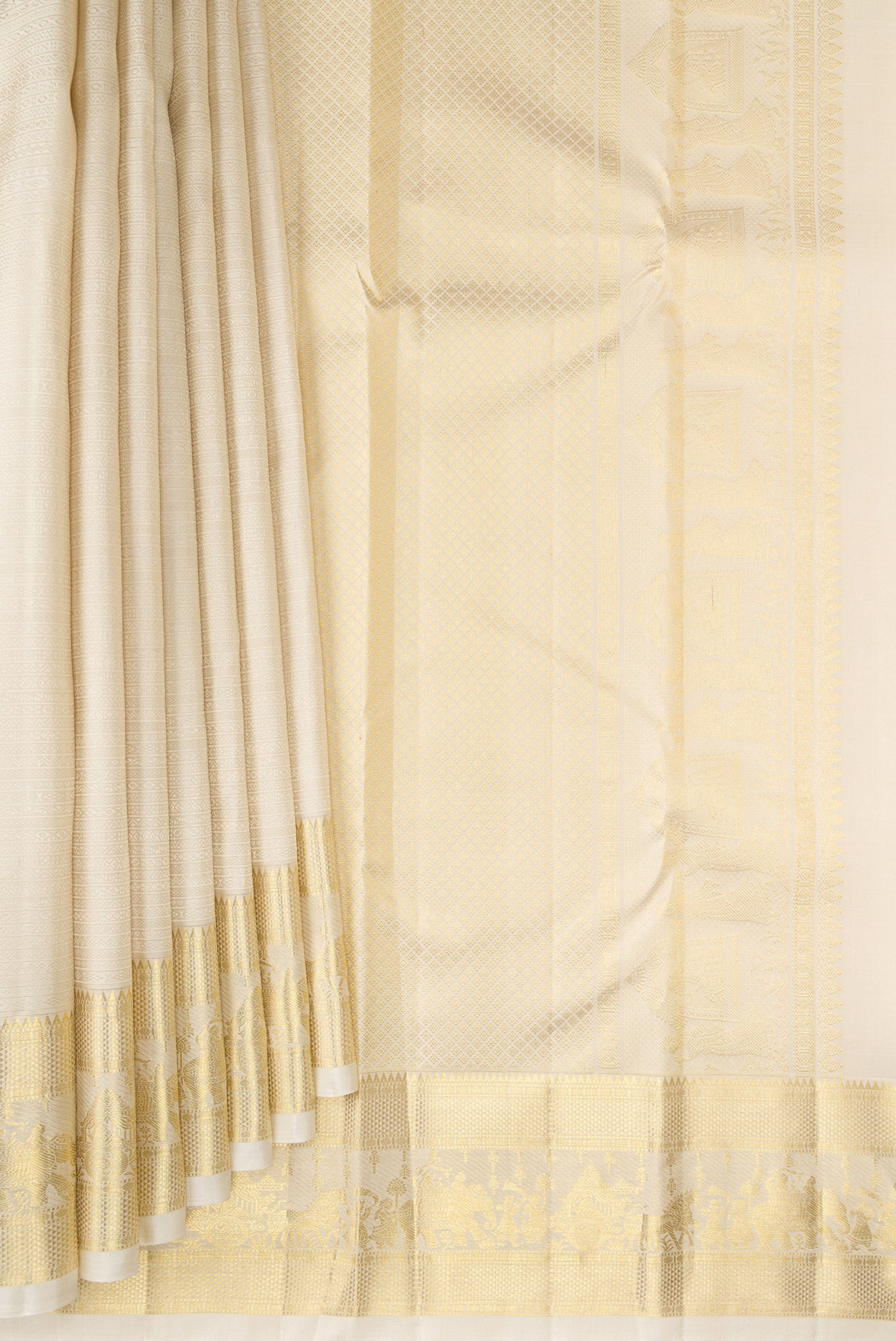 Pleats and pallu of Cream Kanjivaram Silk Saree with Jacquard design on the body and Zari Border. 