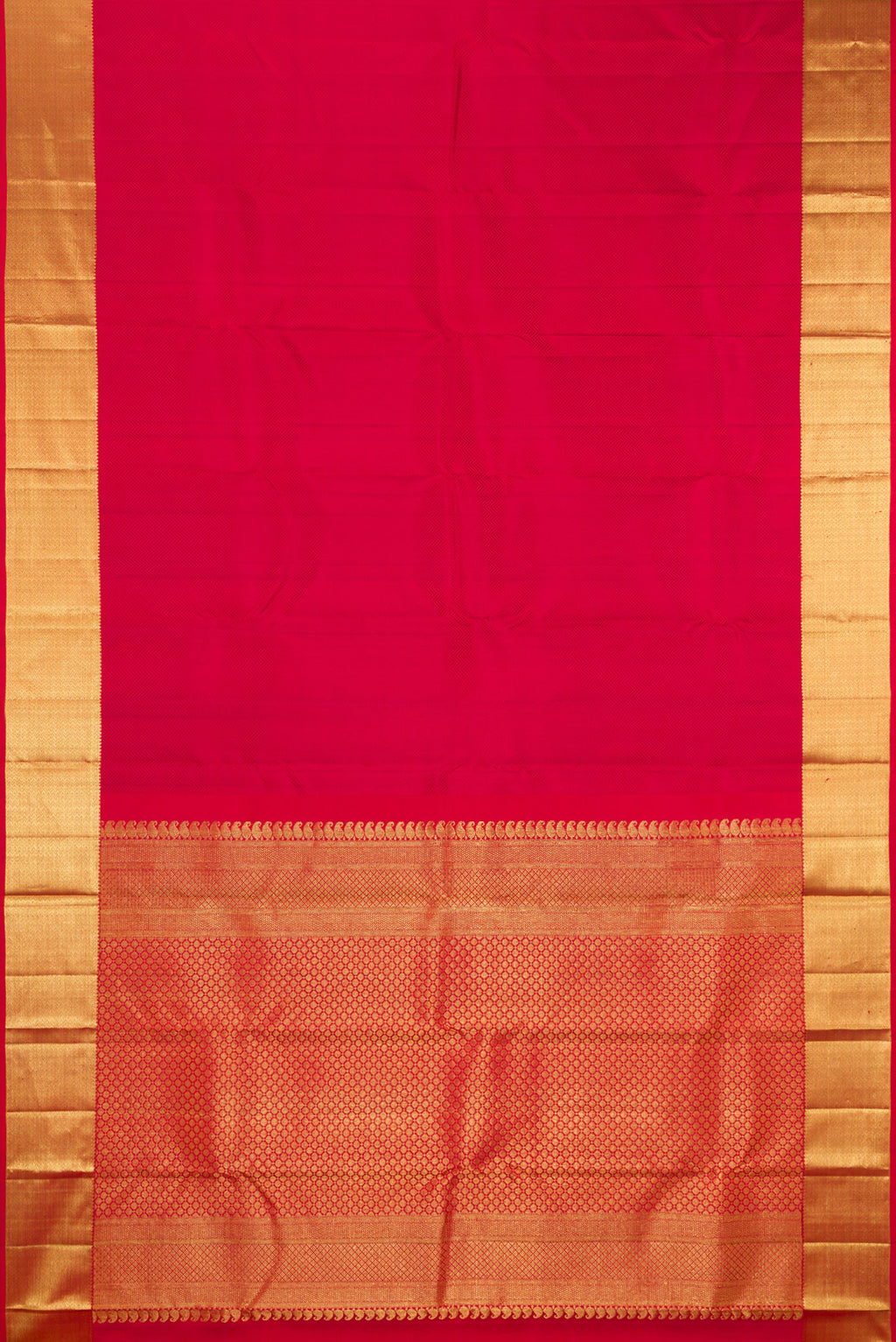 Flat view of Red Kanjivaram Silk Saree with Jacquard design on the body and Zari Border. 