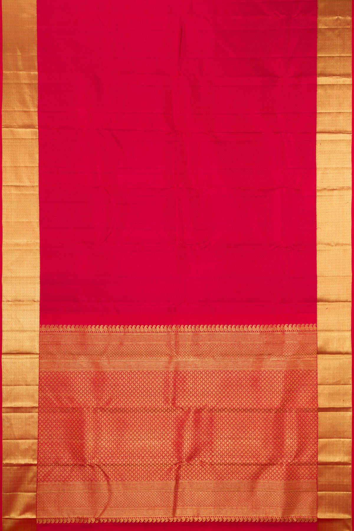 Flat view of Red Kanjivaram Silk Saree with Jacquard design on the body and Zari Border. 