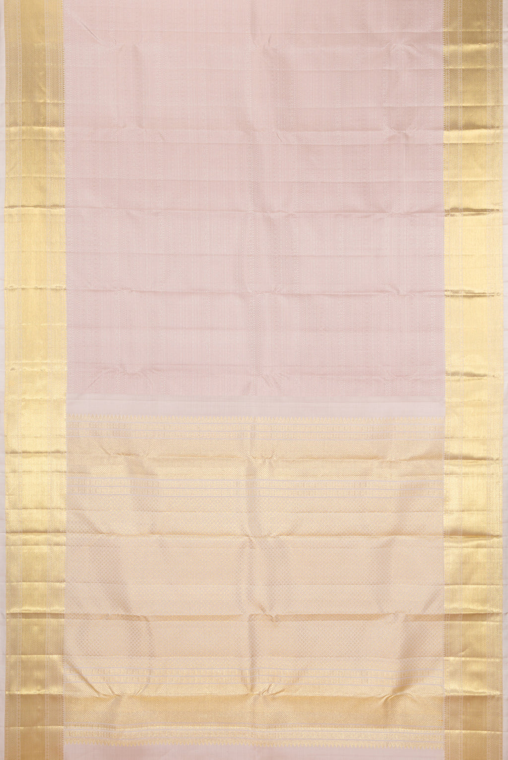 Flat view of Rose Gold Kanjivaram Silk Saree with Jacquard design on the body and Zari Border. 
