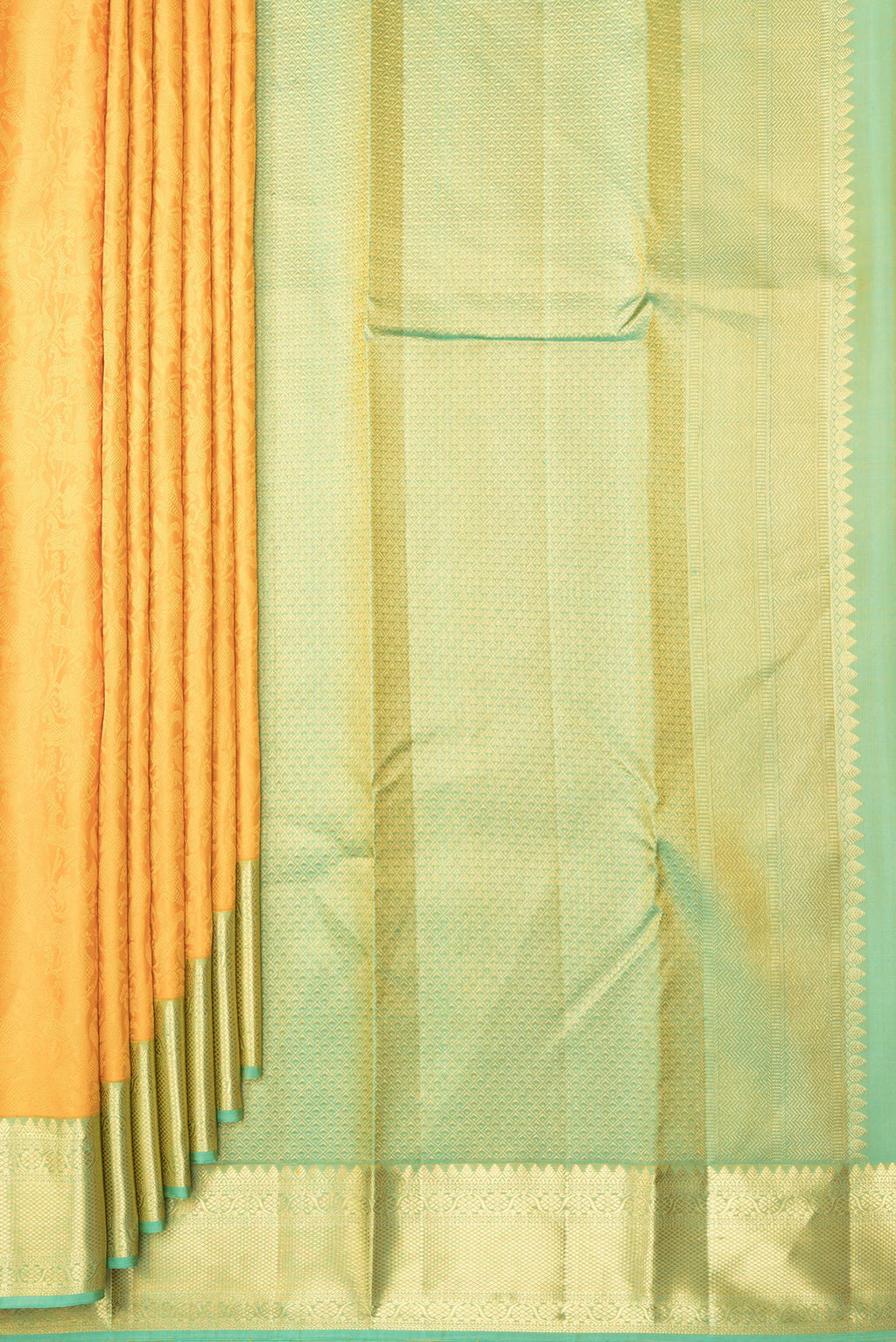 Pleats and pallu of Pure Silk Mustard Dual Tone Kanjivaram Saree with Jacquard design on the body and Zari Border. 