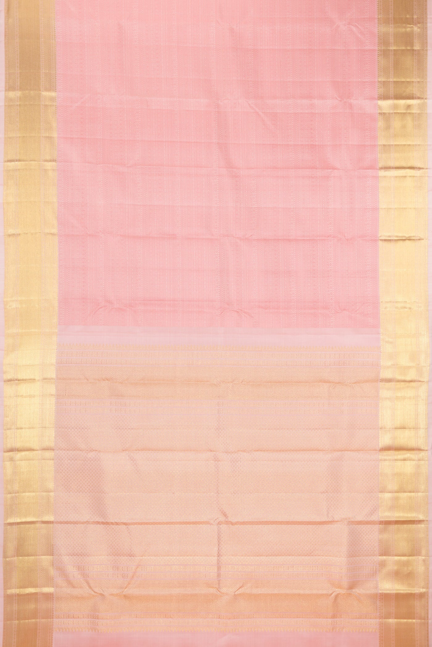 Flat view of Golden Peach Kanjivaram Silk Saree with Jacquard design on the body and Zari Border. 