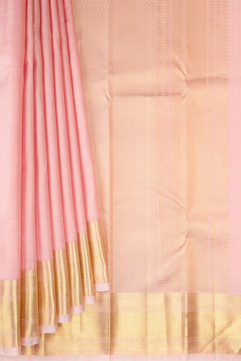 Pleats and pallu of Golden Peach Kanjivaram Silk Saree with Jacquard design on the body and Zari Border. 