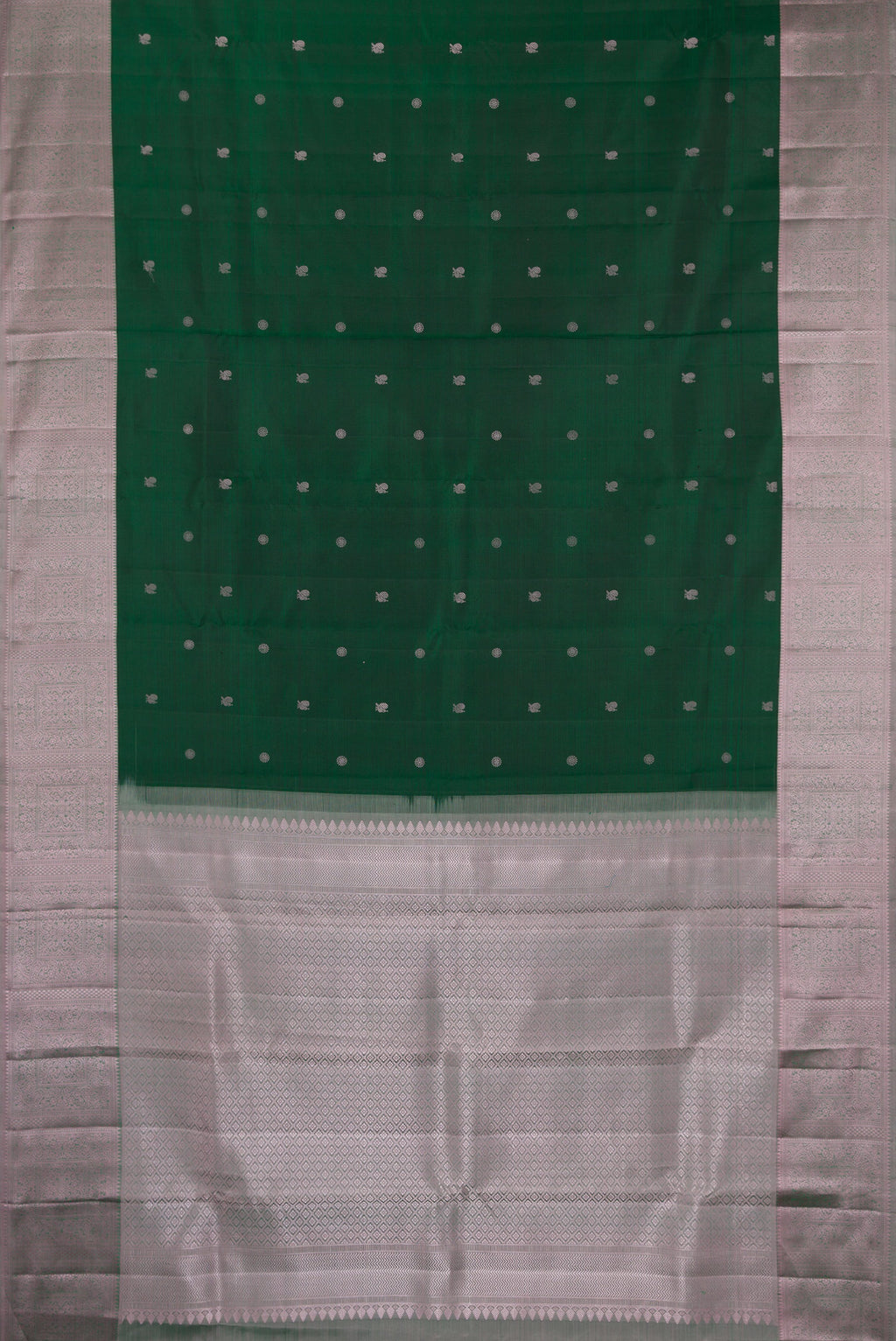 Flat view of Pure Silk Bottle Green Kanchipuram Saree with Thread Butta on the body and Thread Border. 